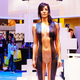 Illustration for article titled These Naked Women Were Selling Phones or Something at CES